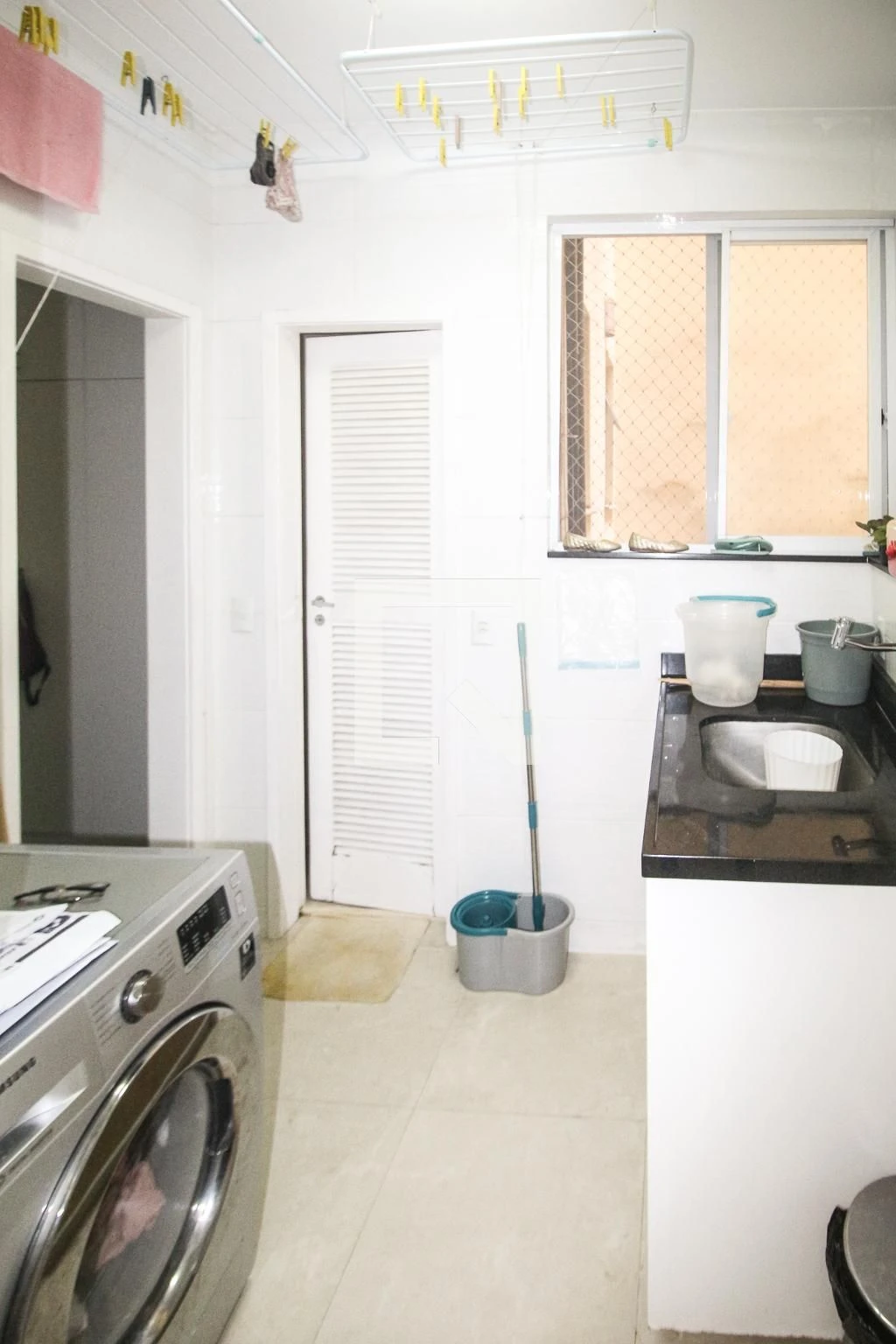 Washing machine in a 3-bedroom apartment, 136 m² — photo 16
