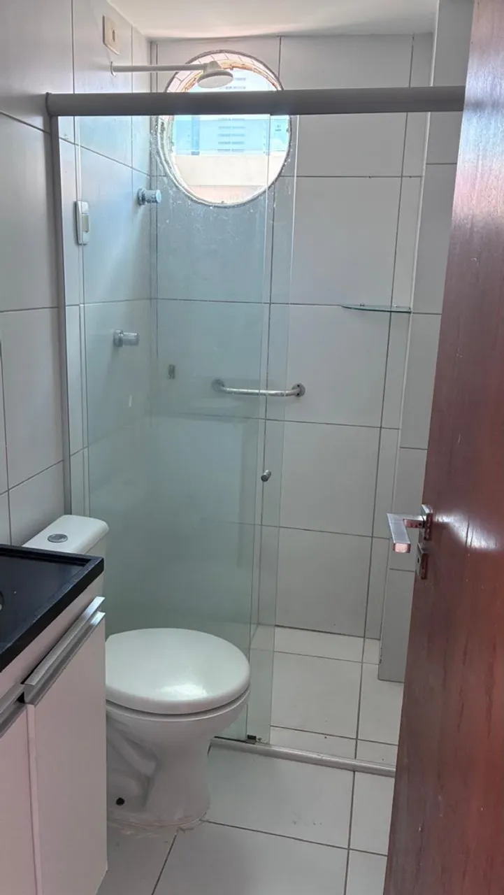 2-bedroom apartment in a building with a pool — photo 5