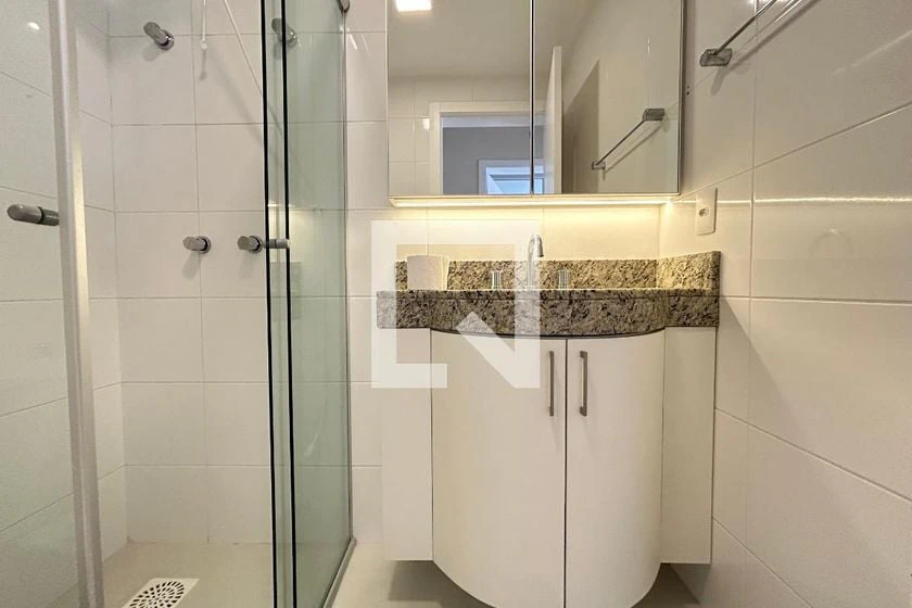 2-bedroom apartment in a building with a pool — photo 26