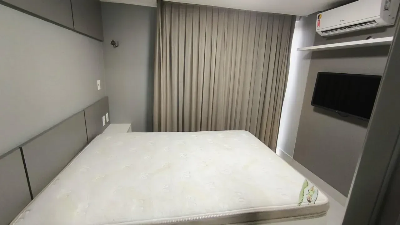 2-bedroom apartment in a building with a pool — photo 4