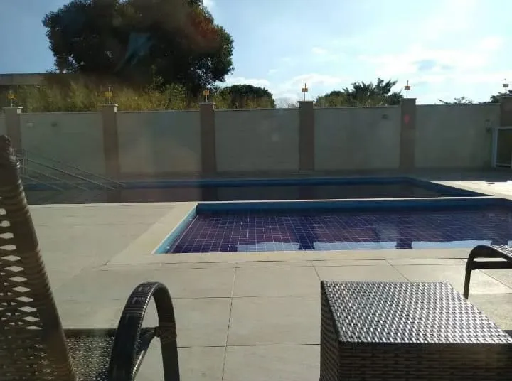 2-bedroom apartment in a building with a pool — photo 8
