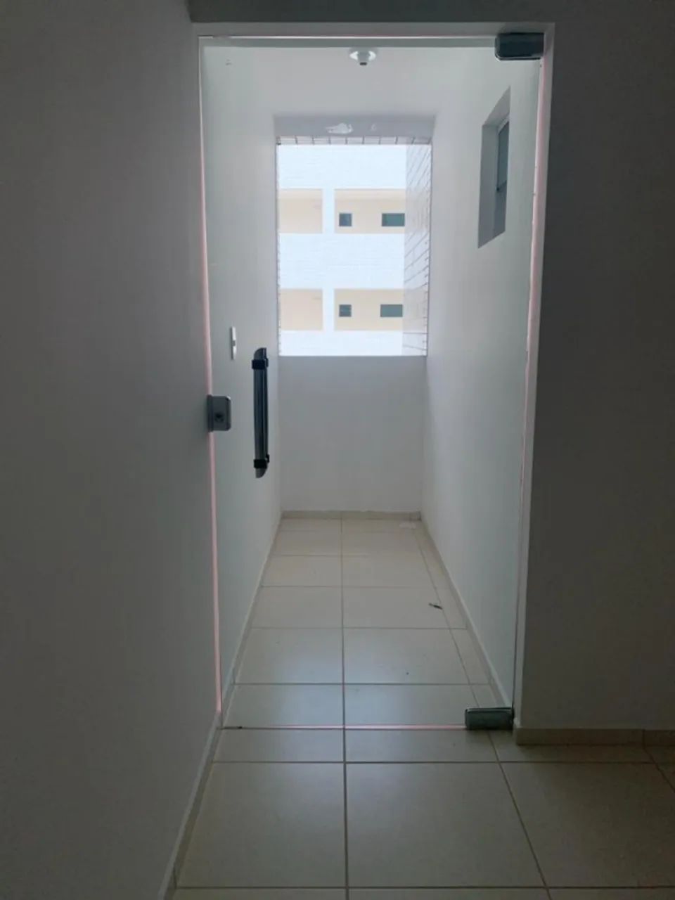 2-bedroom apartment in a building with a pool — photo 12