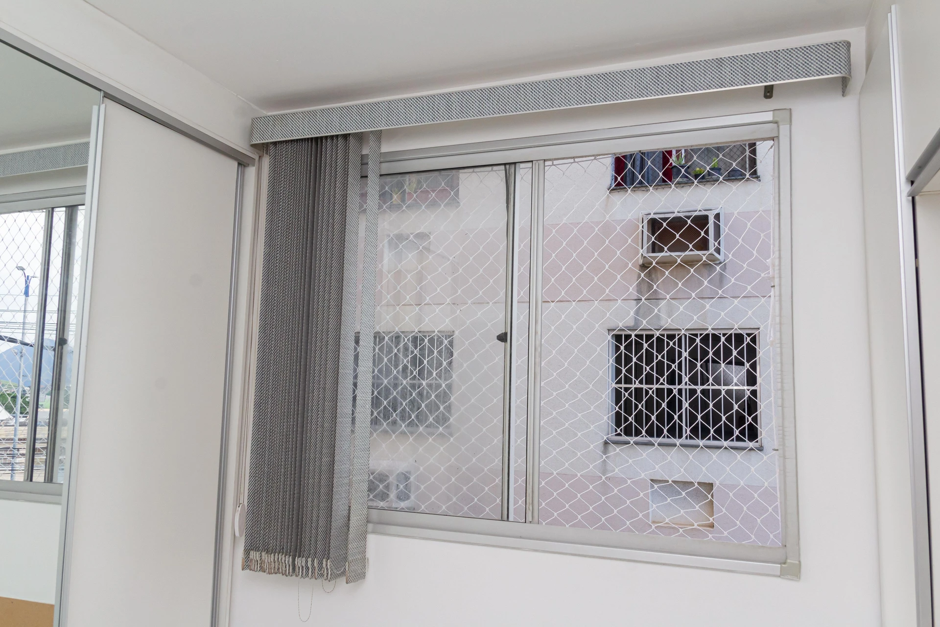 2-bedroom apartment in a building with a pool — photo 51