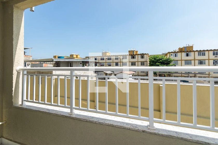 2-bedroom apartment in a building with a pool