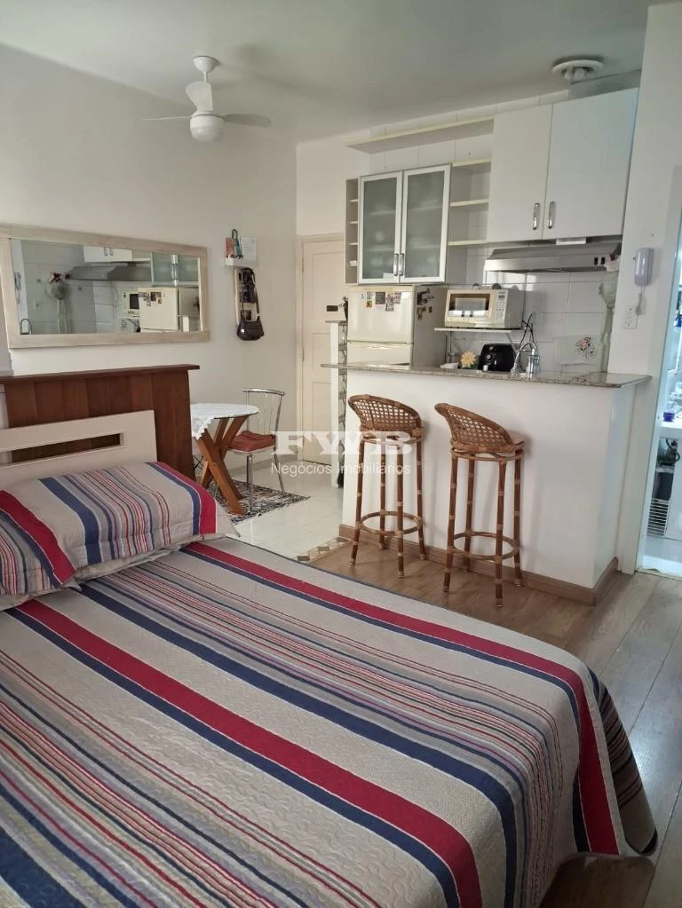Furnished studio-style apartment with an open kitchen