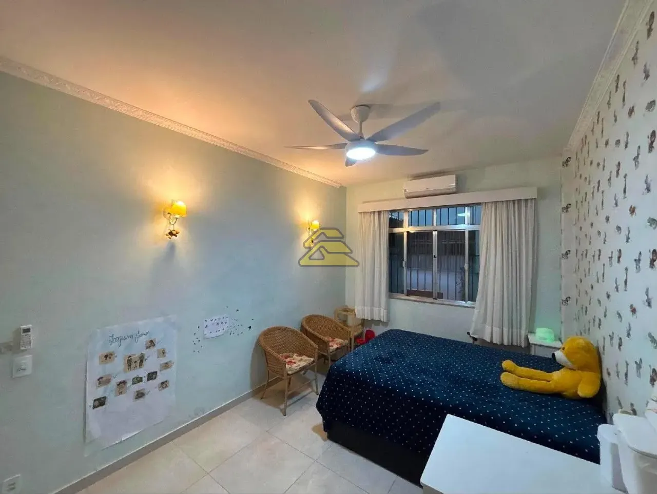 3-bedroom apartment with wall TV unit and tile floors — photo 11