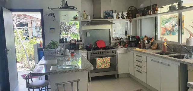 Casa com 3 dormitórios, 5 banheiros e 650 m² — photo 2