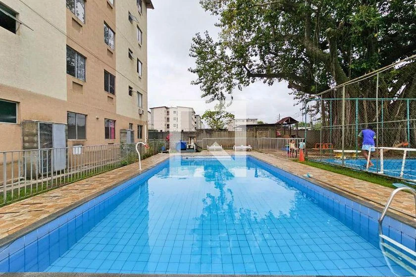 2-bedroom apartment in a building with a pool — photo 10