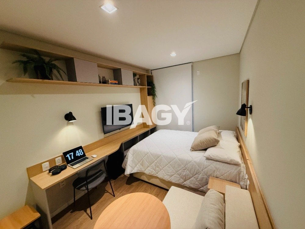Furnished studio with 1 bedroom and city-facing windows