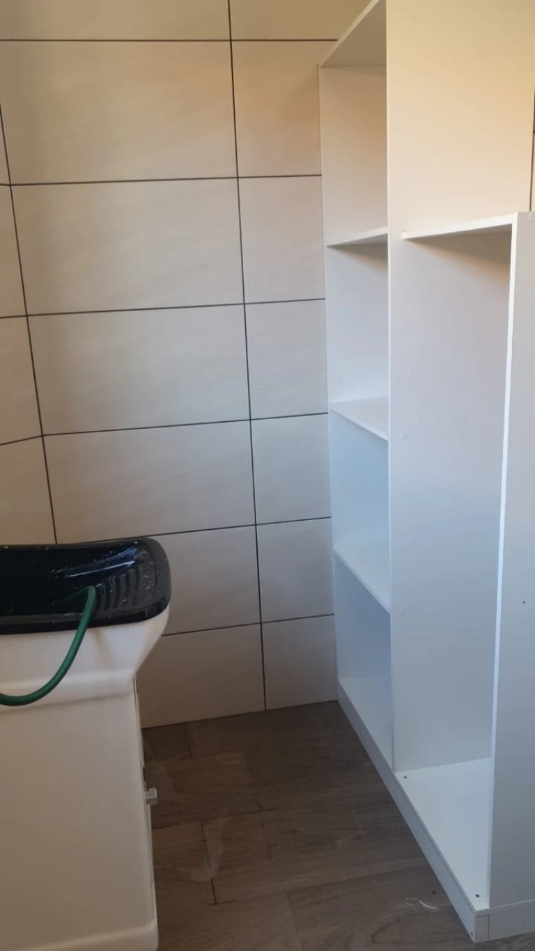 Wood or laminate floors in a 3-bedroom house, 84 m² — photo 12