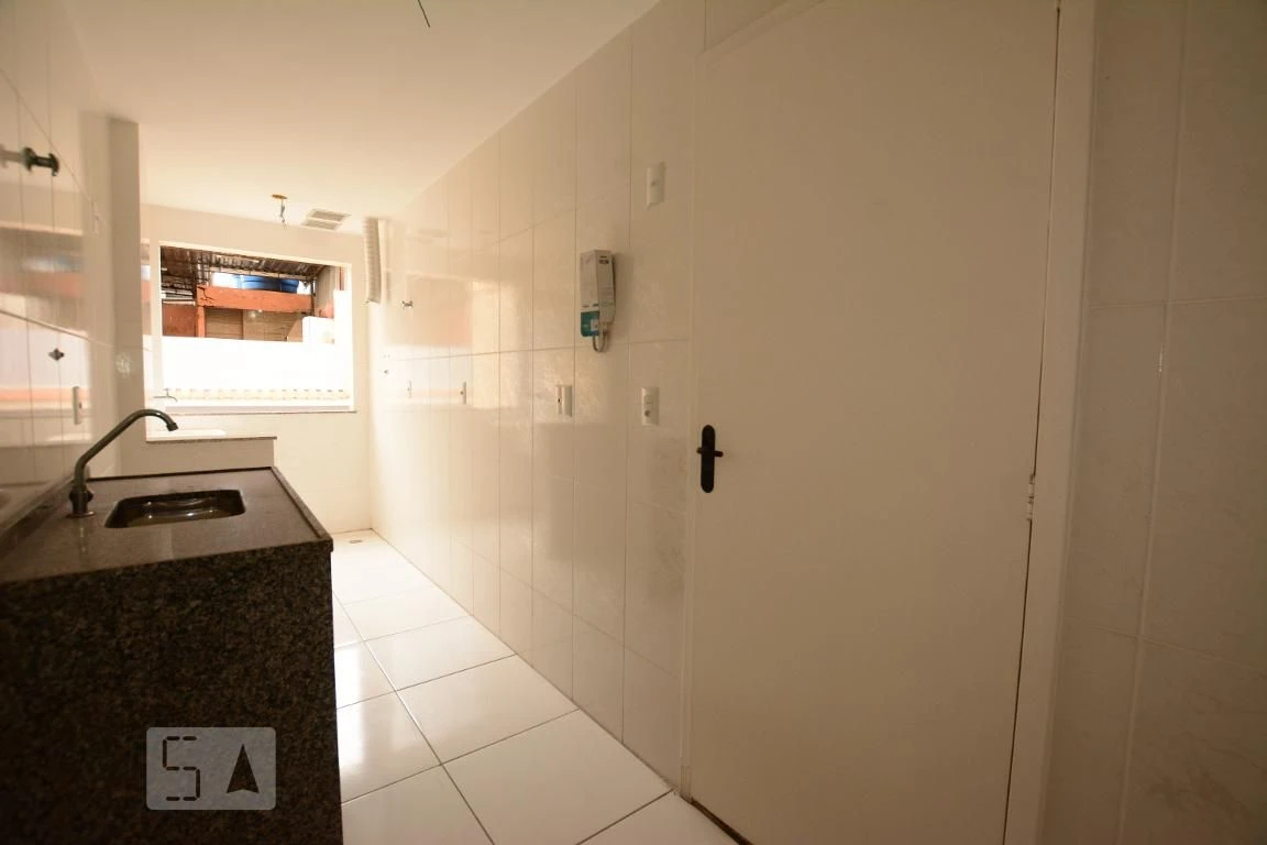 2-bedroom apartment with balcony sink and utility area — photo 29