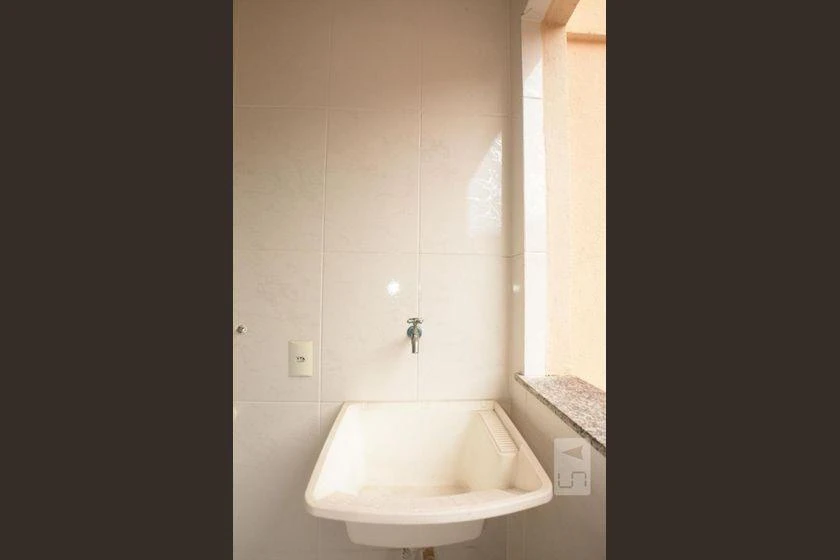 2-bedroom apartment with balcony sink and utility area — photo 45