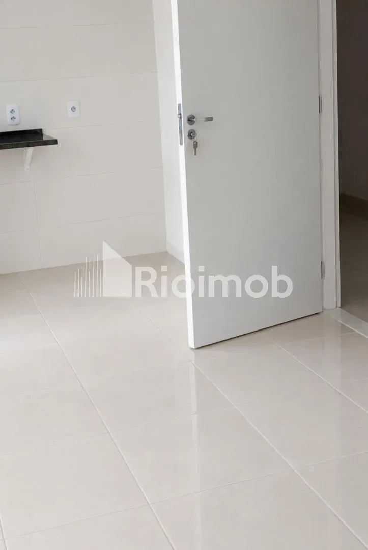 2-bedroom apartment in a building with a pool