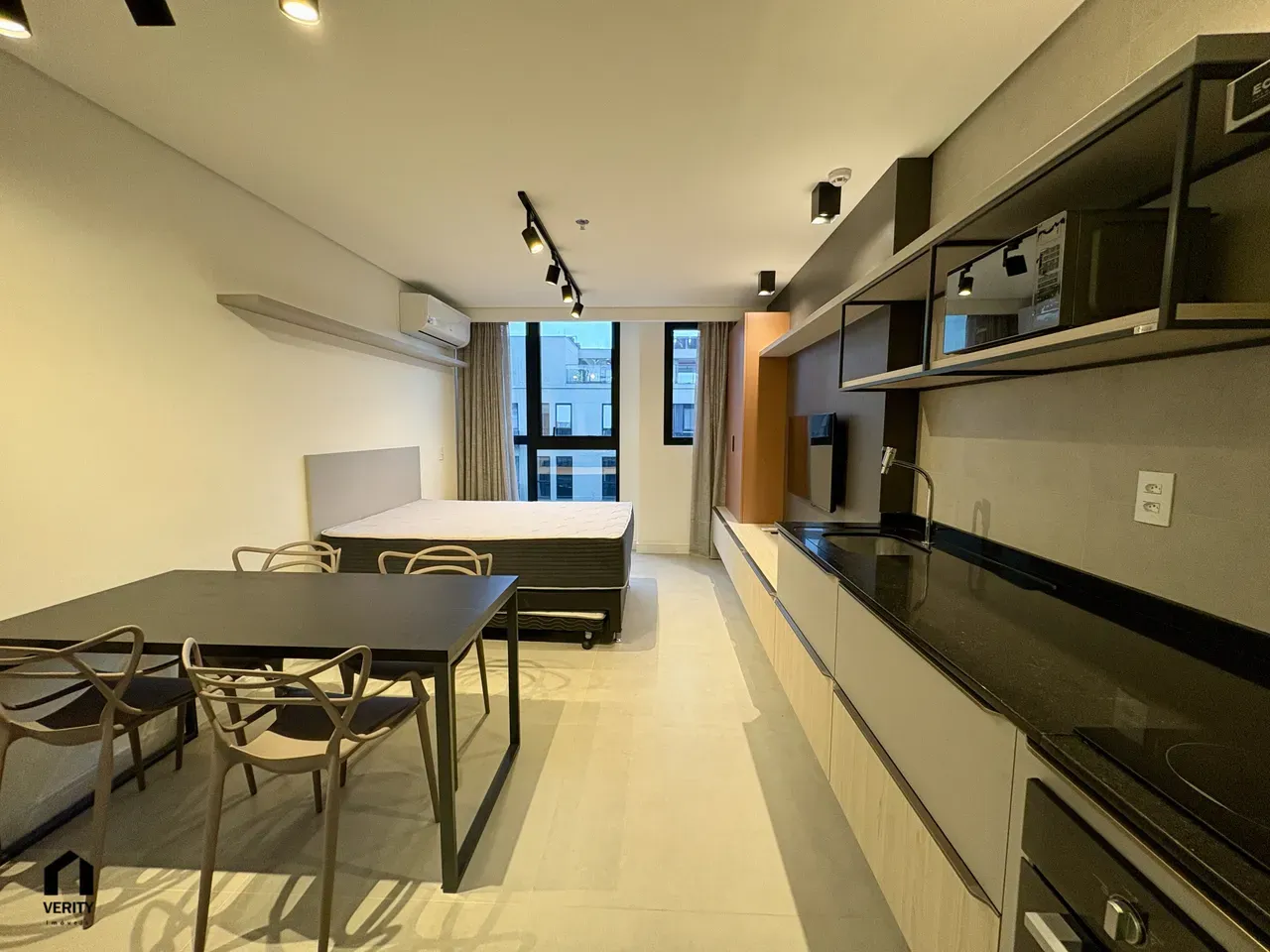 Furnished studio with an open-plan kitchen and A/C — photo 9