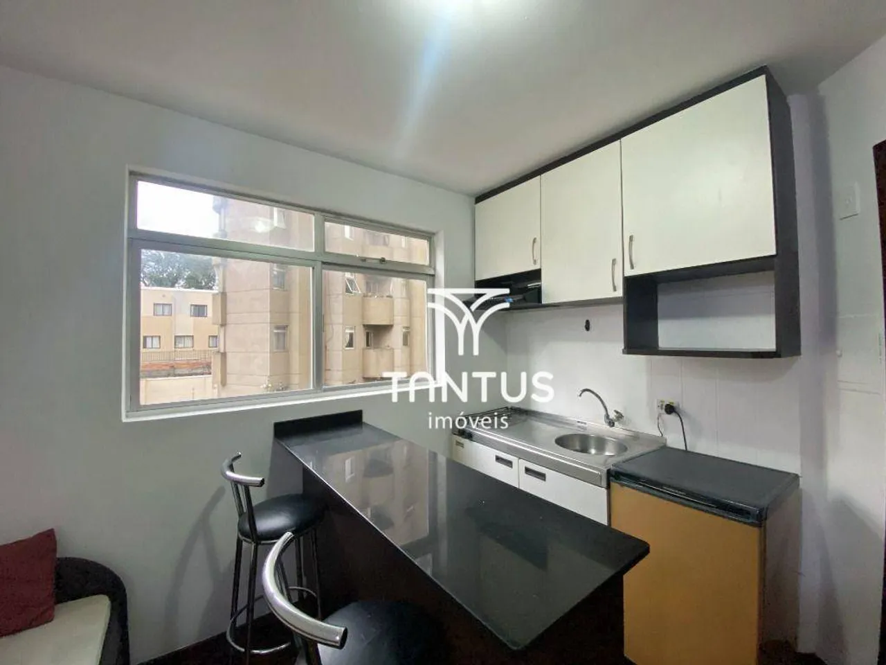 1-bedroom 24 m² apartment with a compact kitchen corner — photo 5