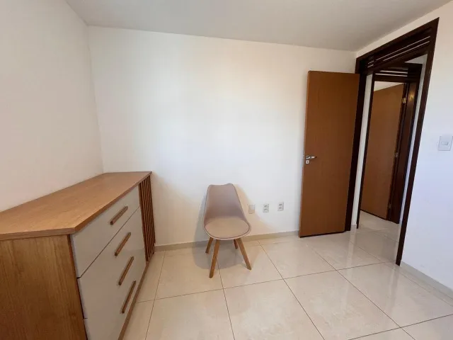 2-bedroom apartment in a building with a pool — photo 9