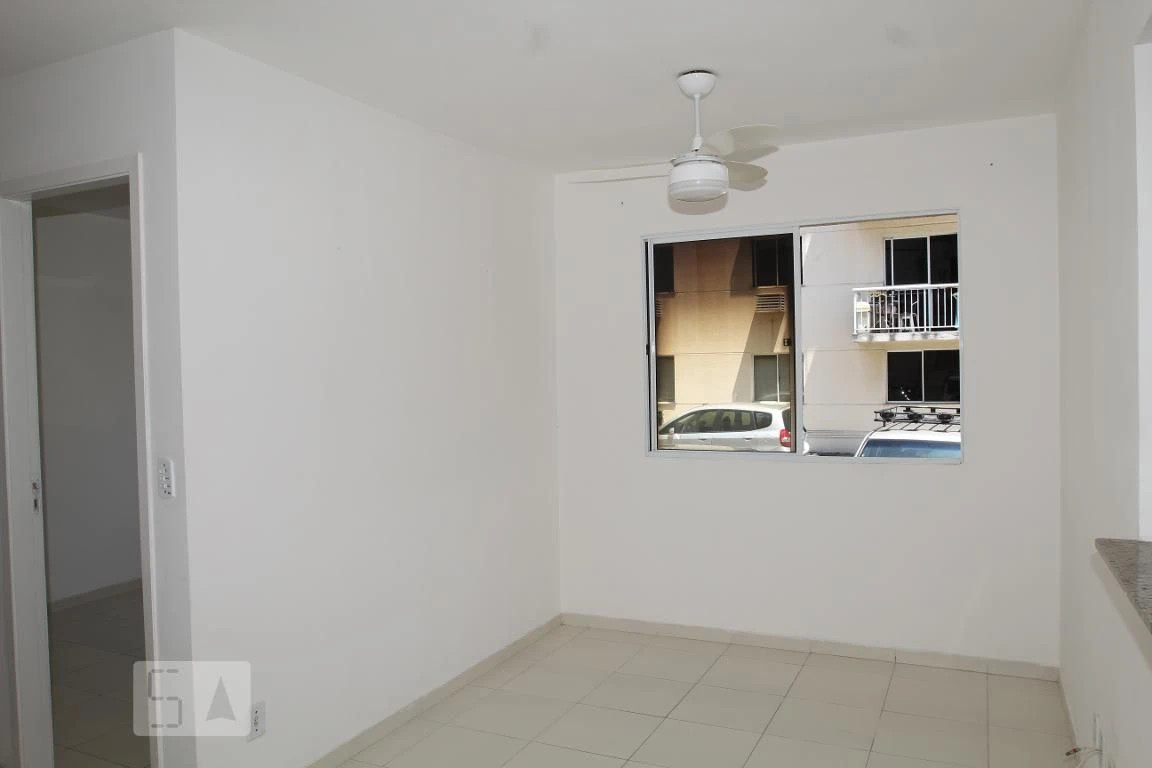 2-bedroom apartment in a building with a pool