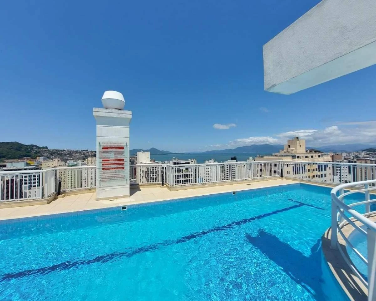 2-bedroom apartment in a building with a pool — photo 40