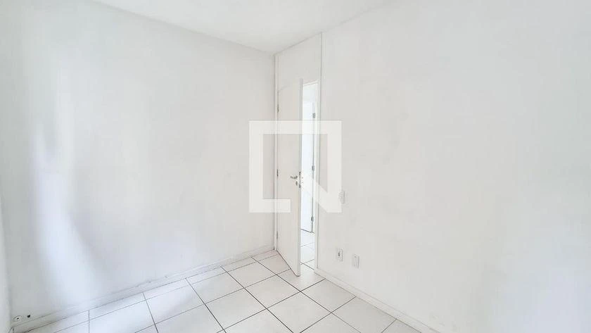 2-bedroom apartment in a building with a pool — photo 31