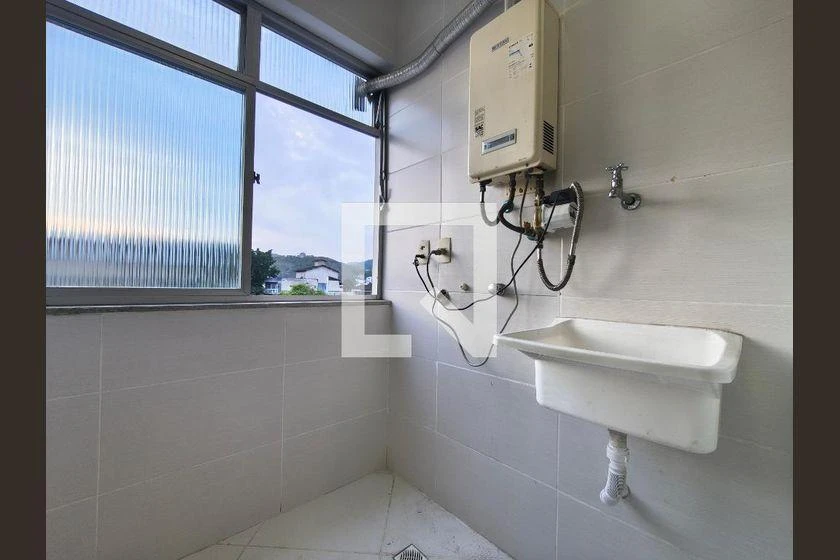 2-bedroom apartment in a building with a pool — photo 7