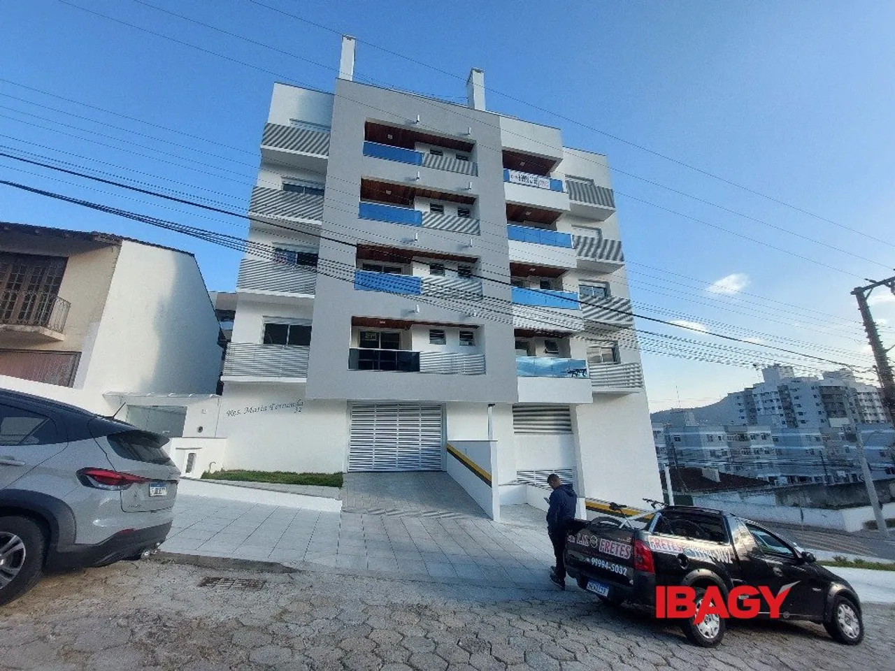 2-bedroom apartment in a building with a pool — photo 12