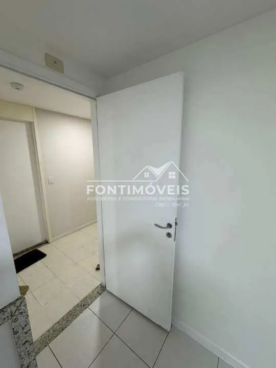 One-bedroom apartment in a building with a pool — photo 13