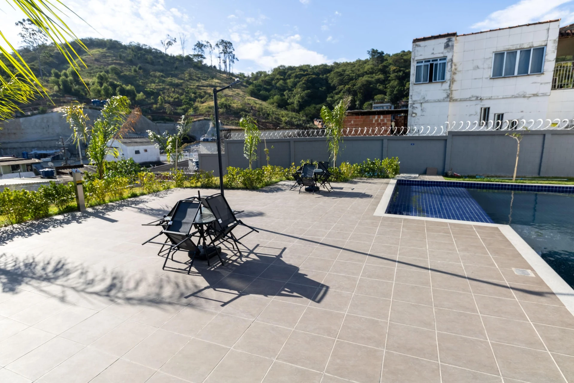 2-bedroom apartment in a building with a pool — photo 12