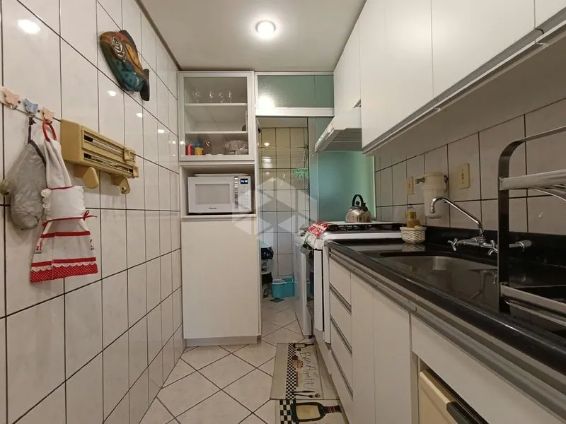 Balcony with a grill in a 3-bedroom apartment, 80 m² — photo 2