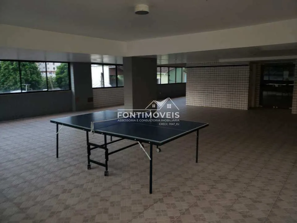 2-bedroom apartment in a building with a pool — photo 16