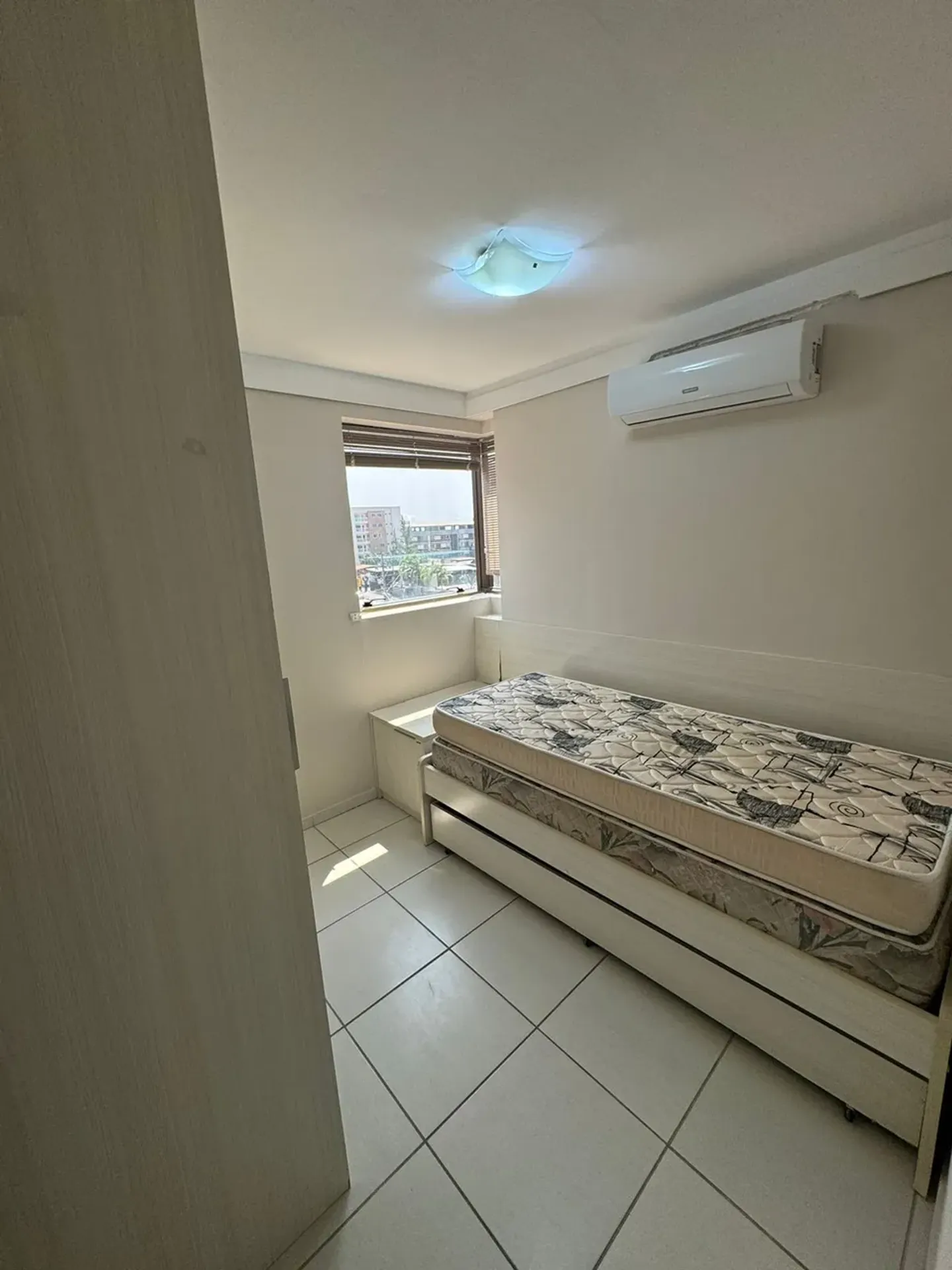 2-bedroom apartment in a building with a pool — photo 10