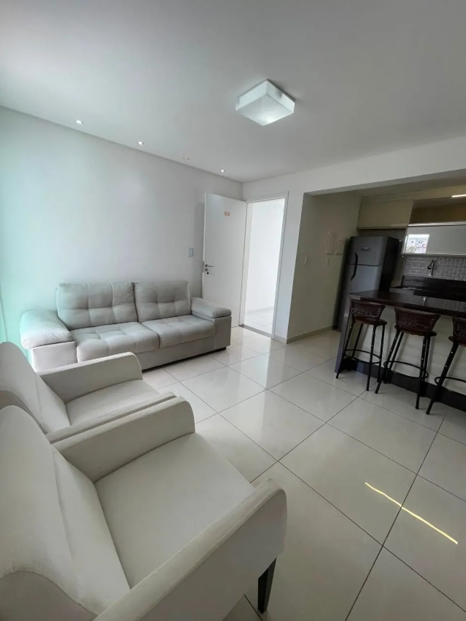 2-bedroom apartment in a building with a gym