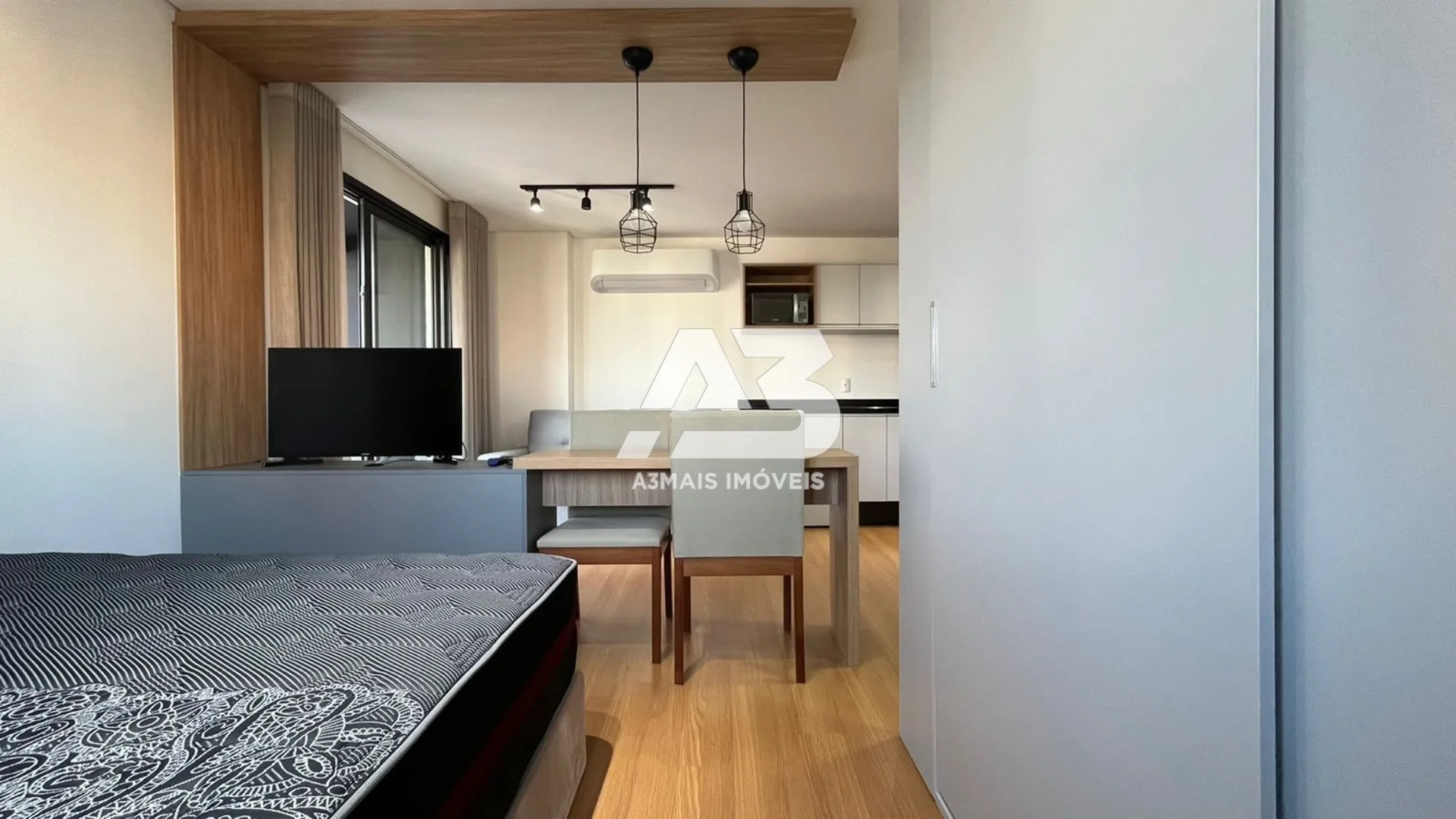 Furnished studio with open-plan kitchen and AC — photo 6