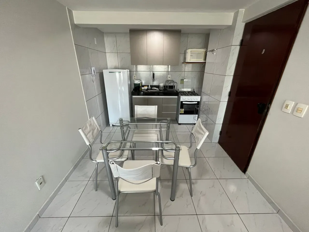 2-bedroom apartment in a building with a pool — photo 2