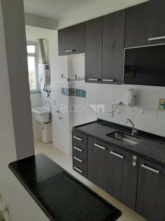 2-bedroom apartment in a building with a pool
