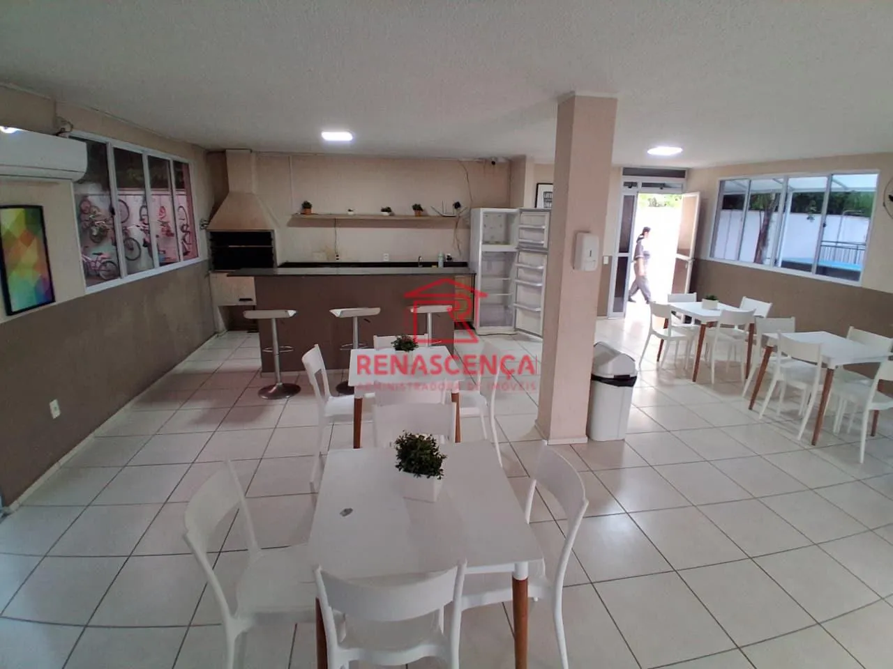 2-bedroom apartment in a building with a pool — photo 16