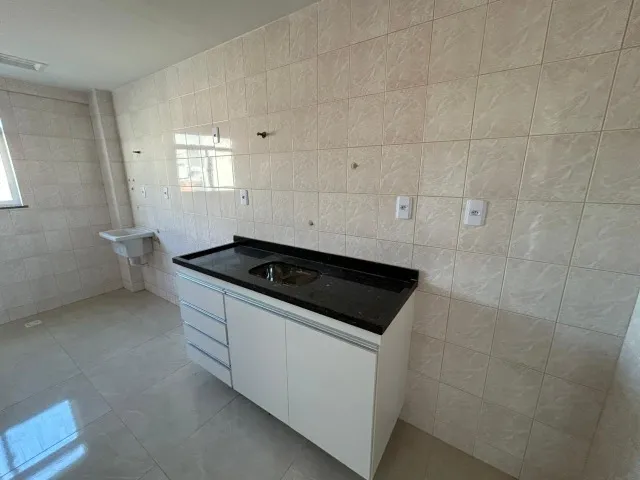 Unfurnished 1-bedroom apartment with open-plan kitchen — photo 16