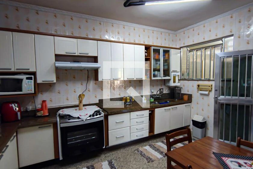 Casa de 420 m² com 4 quartos, 3 vagas e quintal — photo 4