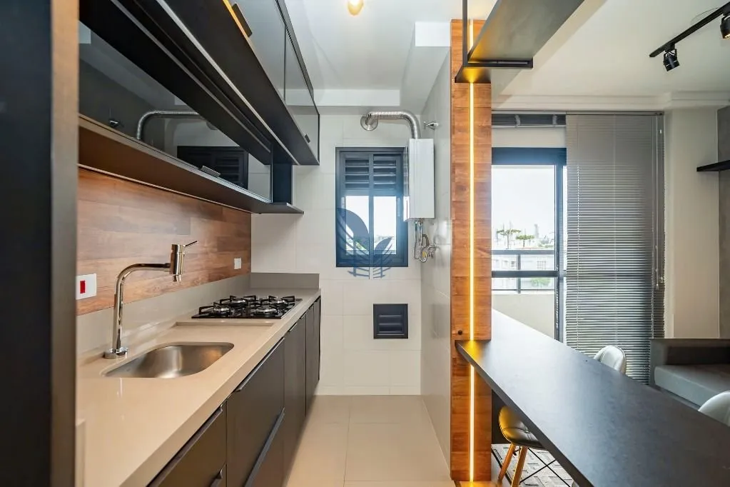 1-bedroom rental with open-plan kitchen and BBQ — photo 2