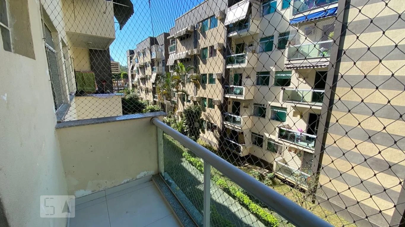 2-bedroom apartment in a building with a pool — photo 16