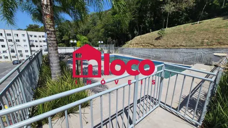 2-bedroom apartment in a building with a pool — photo 5