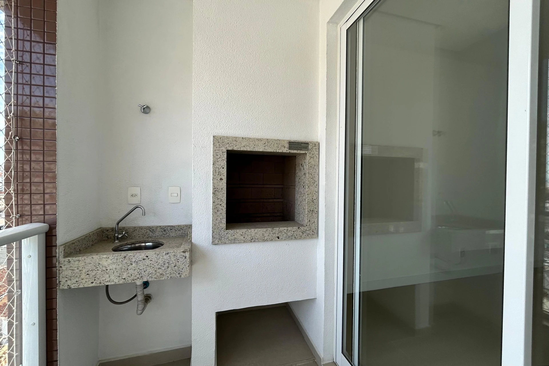 Apartment with a balcony and built-in grill