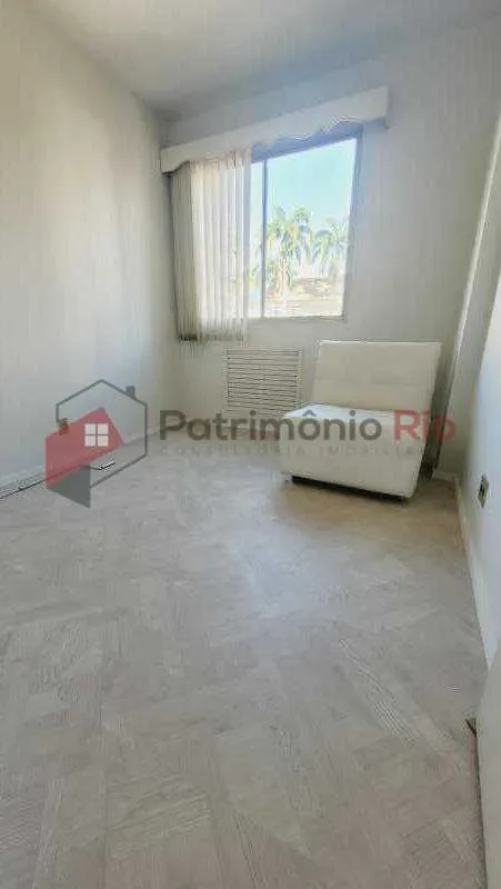 2-bedroom apartment in a building with a pool — photo 2
