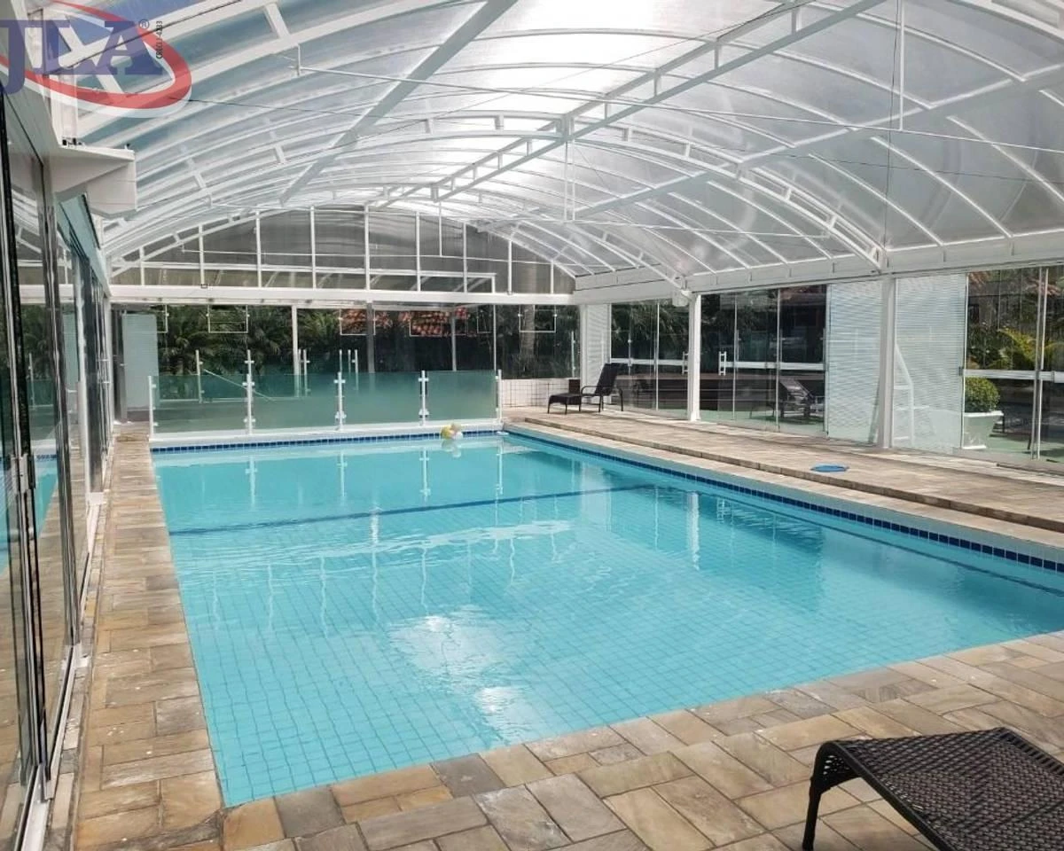 2-bedroom apartment in a building with a pool — photo 15