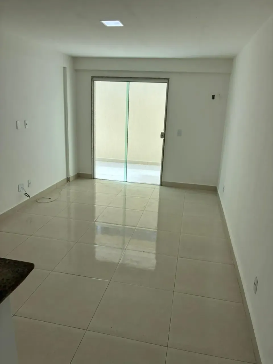 1-bedroom apartment with open-plan kitchen and balcony — photo 12