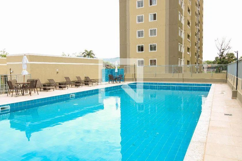 2-bedroom apartment in a building with a pool — photo 30