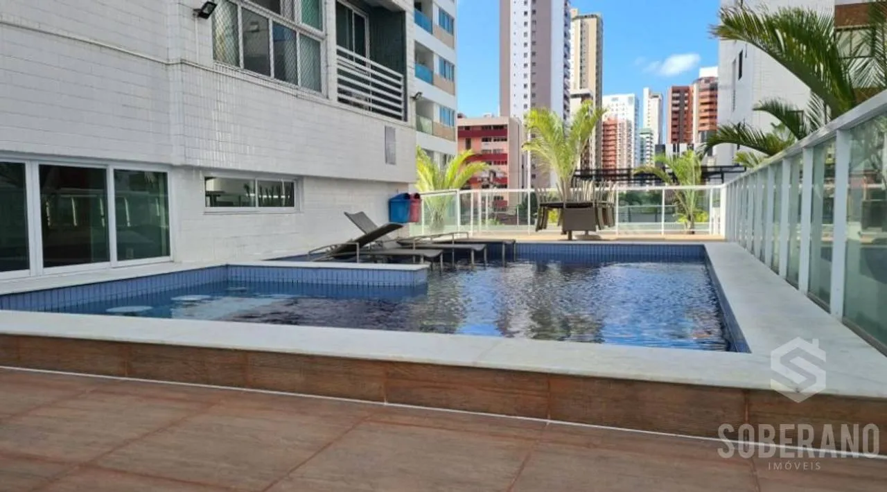 2-bedroom apartment in a building with a pool — photo 4