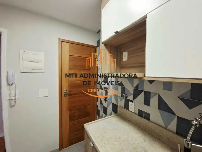 2-bedroom apartment in a building with a pool — photo 24