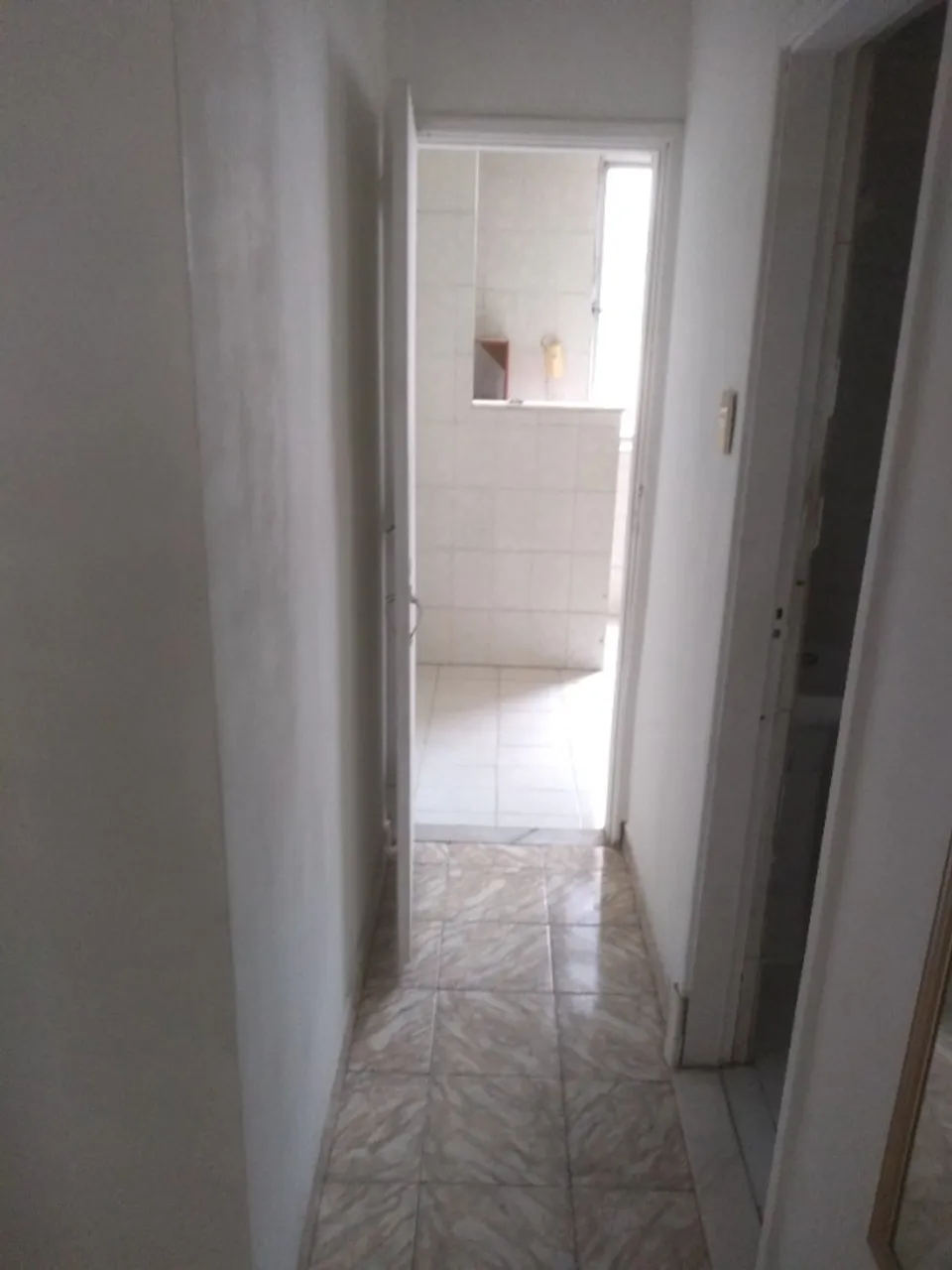1-bedroom 1-bath apartment with a laundry area — photo 8