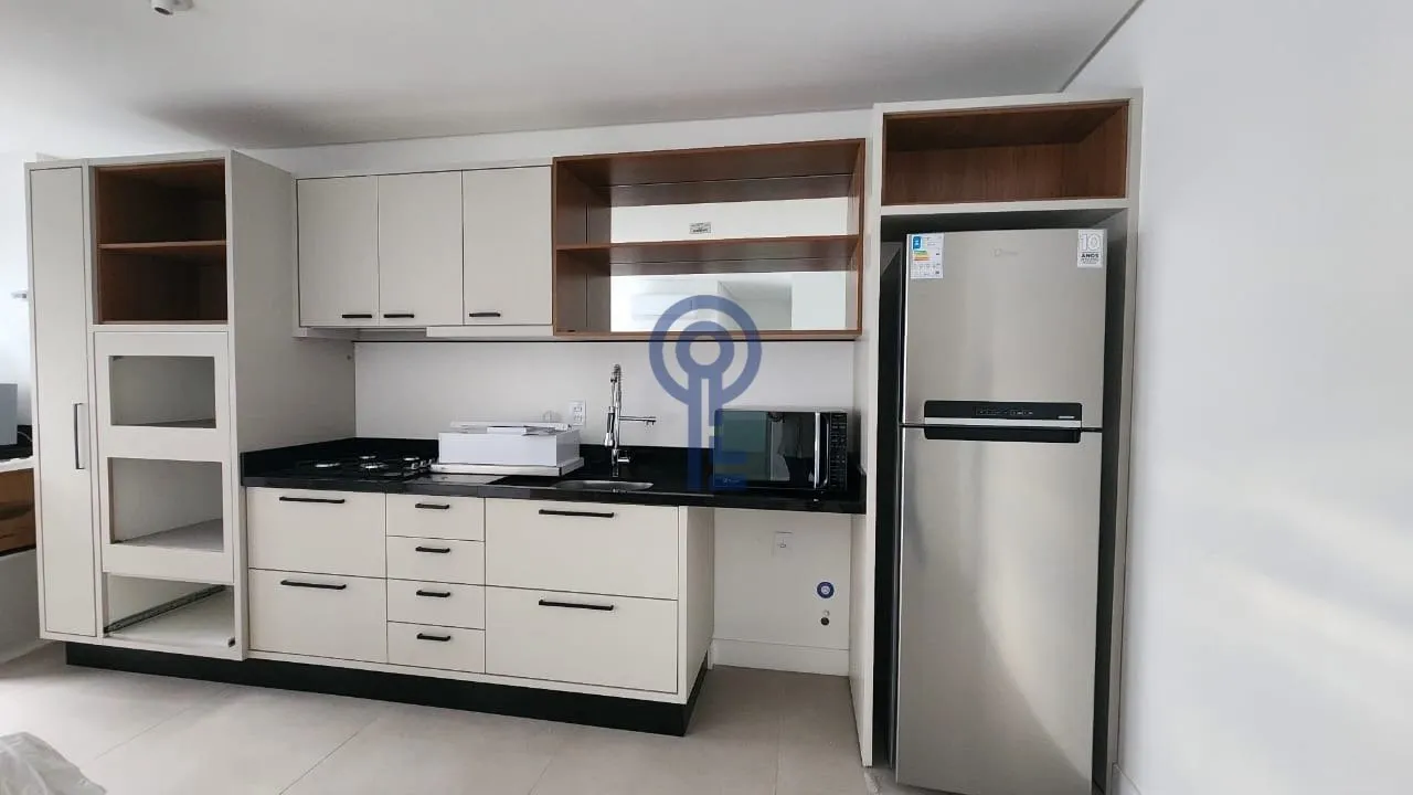 Furnished 59 m² studio with open-plan kitchen and electric stove