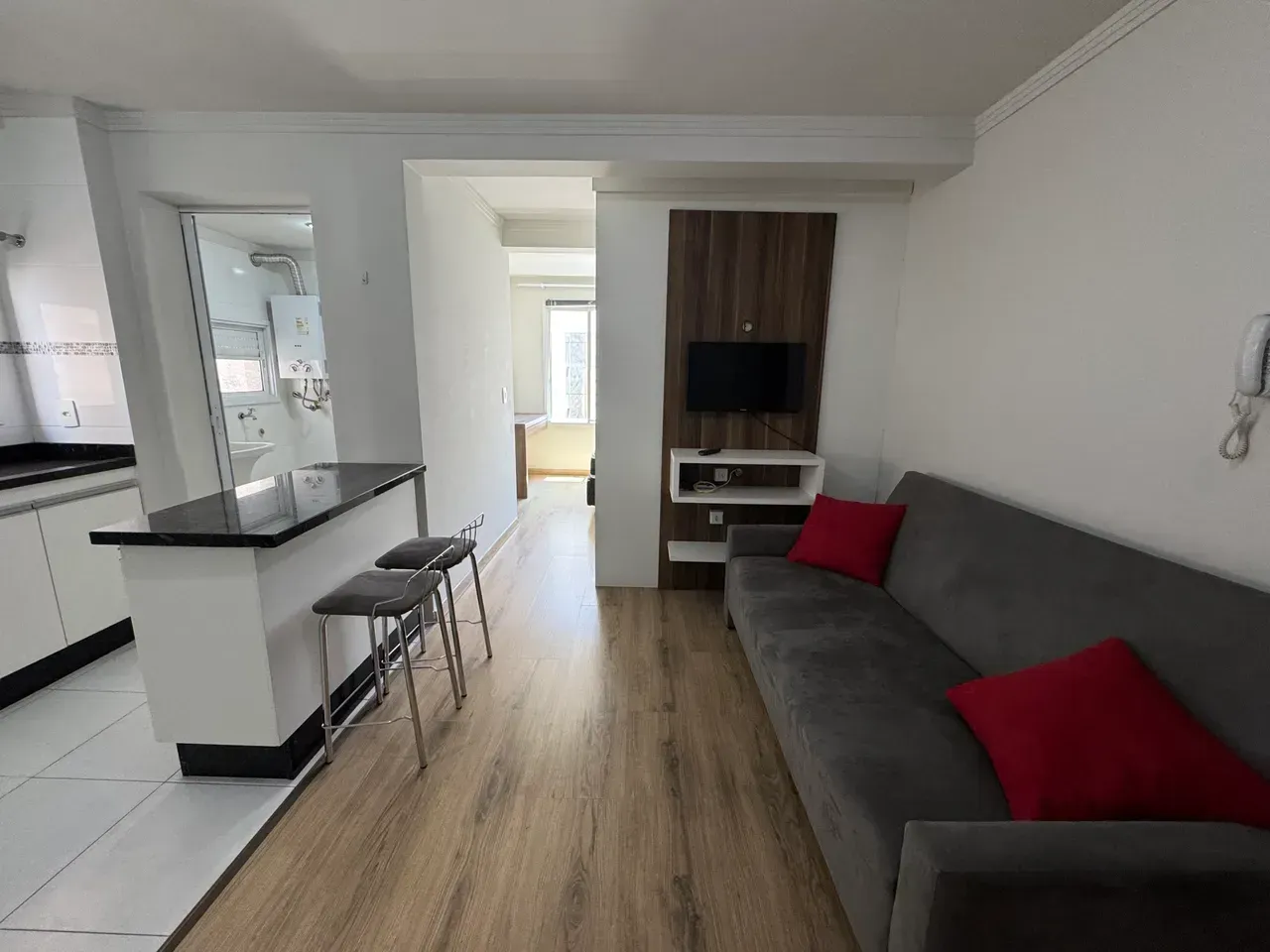 1-bedroom apartment with open kitchen and gas stove — photo 8